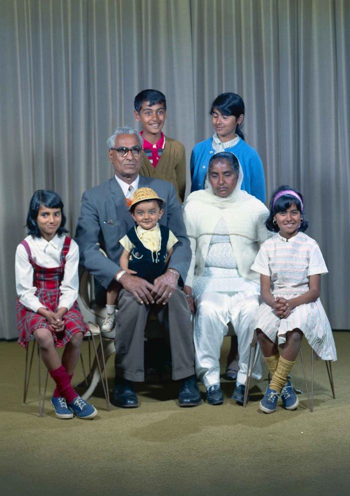 [Group photo of Gurdip Singh Chahal with his family]