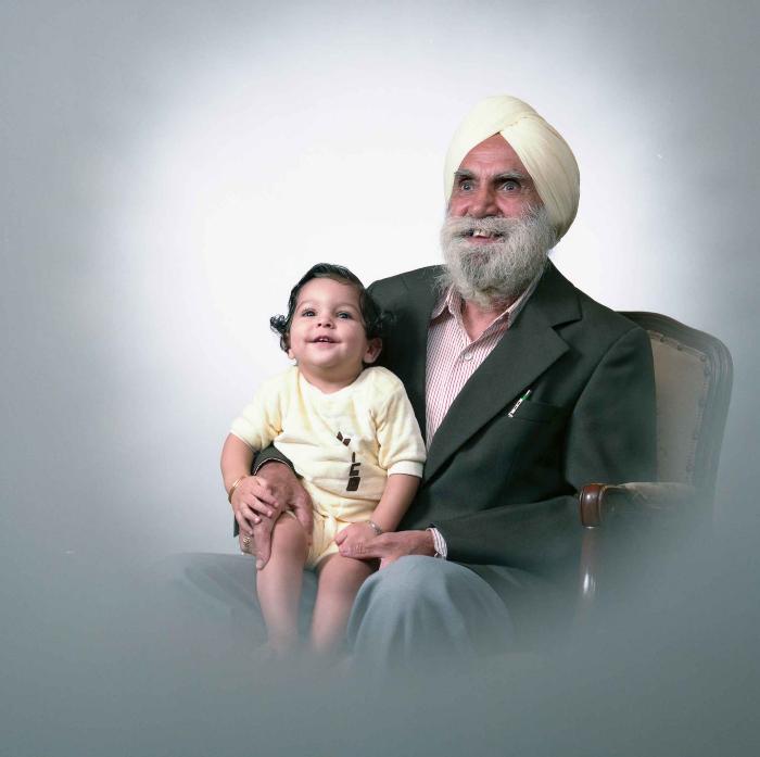 [Portrait of unidentified man with a child]