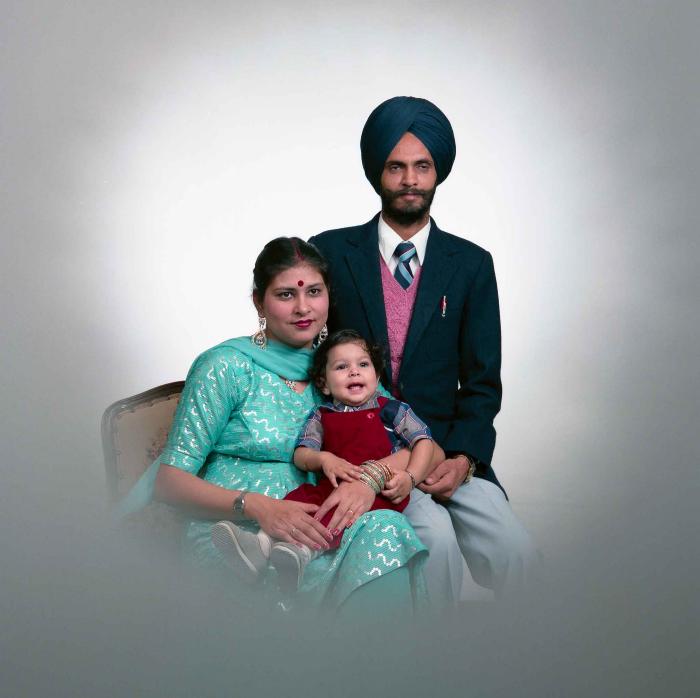 [Portrait of Kesar Singh Chera and an unidentified woman with a child]