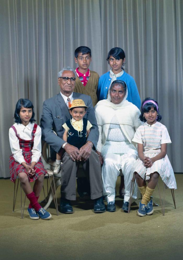 [Group photo of Gurdip Singh Chahal with his family]
