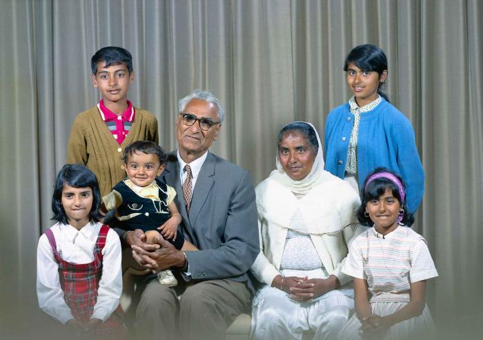 [Group photo of Gurdip Singh Chahal with his family]