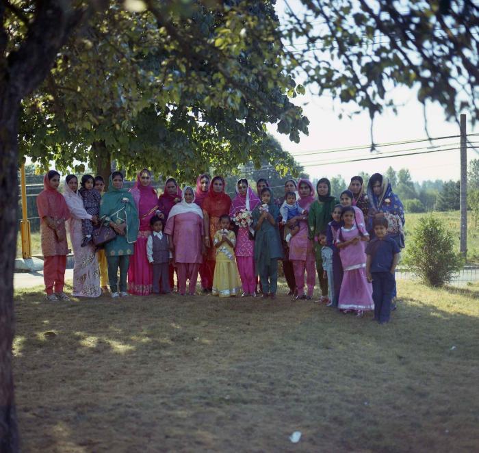 [Group photo of unidentified bride with wedding guests]