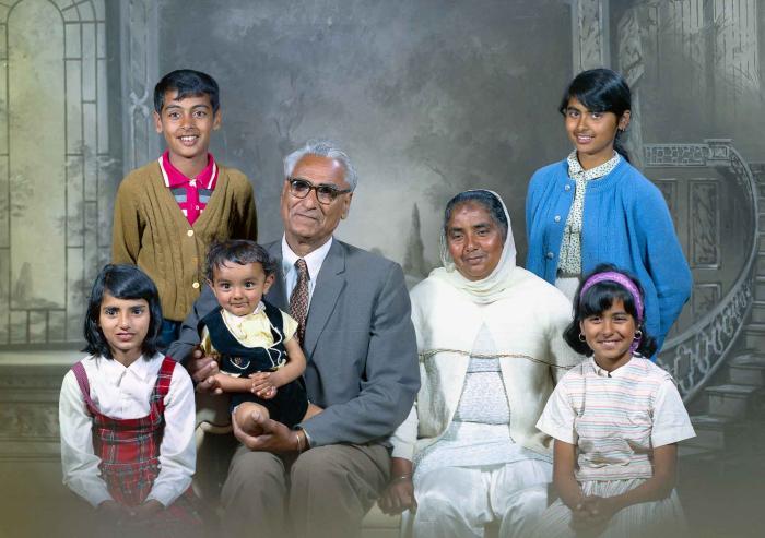 [Group photo of Gurdip Singh Chahal with his family]