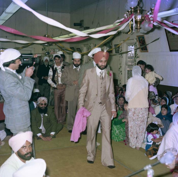 [Portrait of Jagpal Davinder with wedding guests]