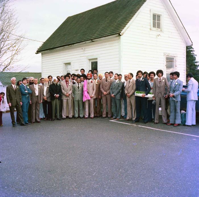 [Group photo of Jagpal Davinder with wedding guests]