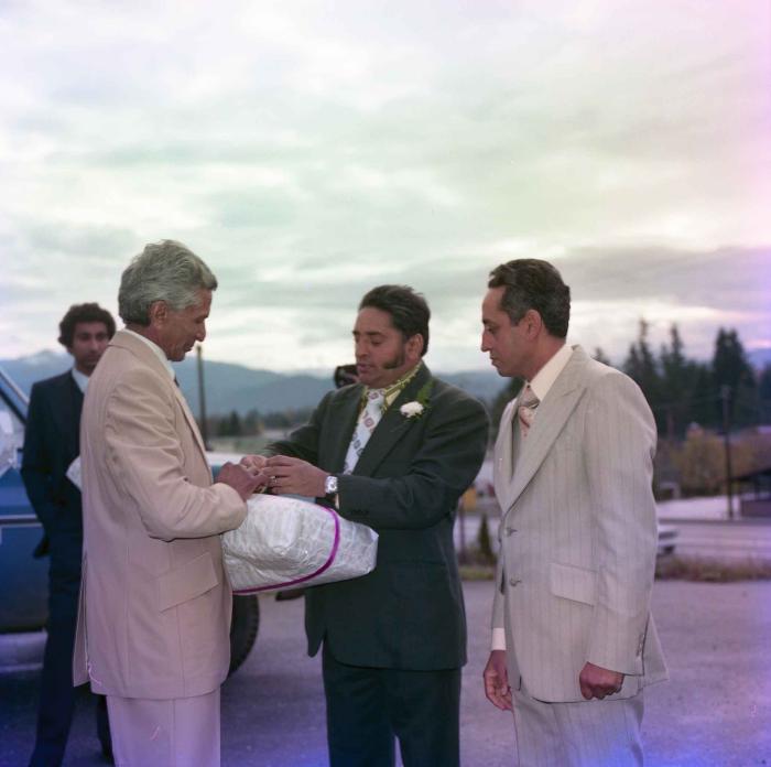 [Group photo of three unidentified man]