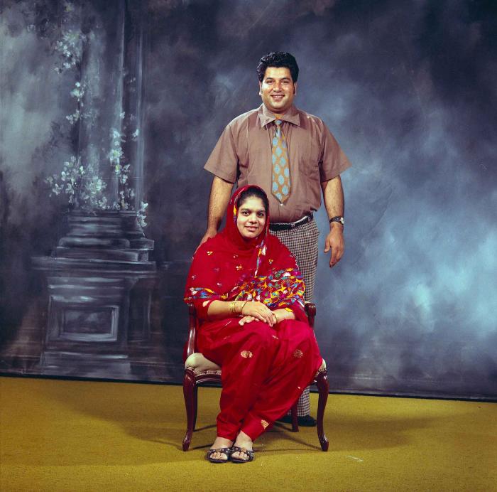 [Photo of Amrik Grewal with an unidentified woman]