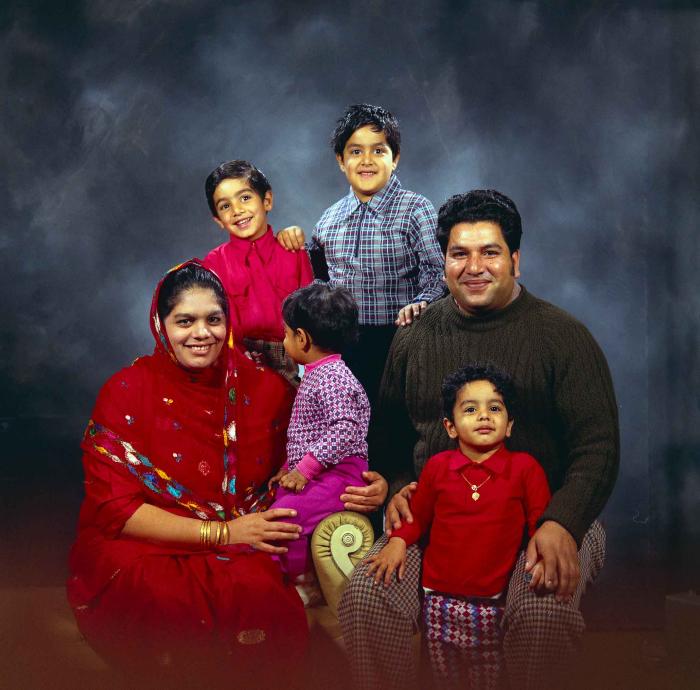 [Group photo of Amrik Grewal with his family]