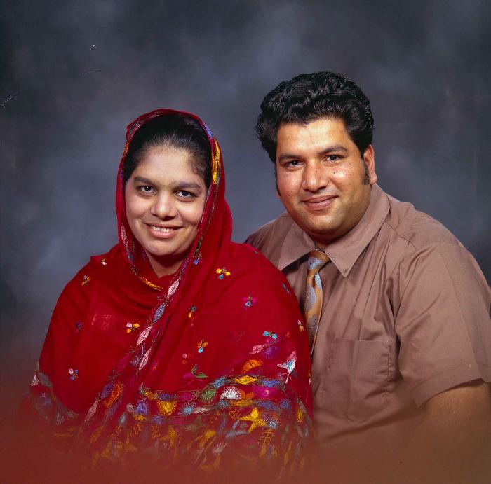 [Photo of Amrik Grewal with an unidentified woman]