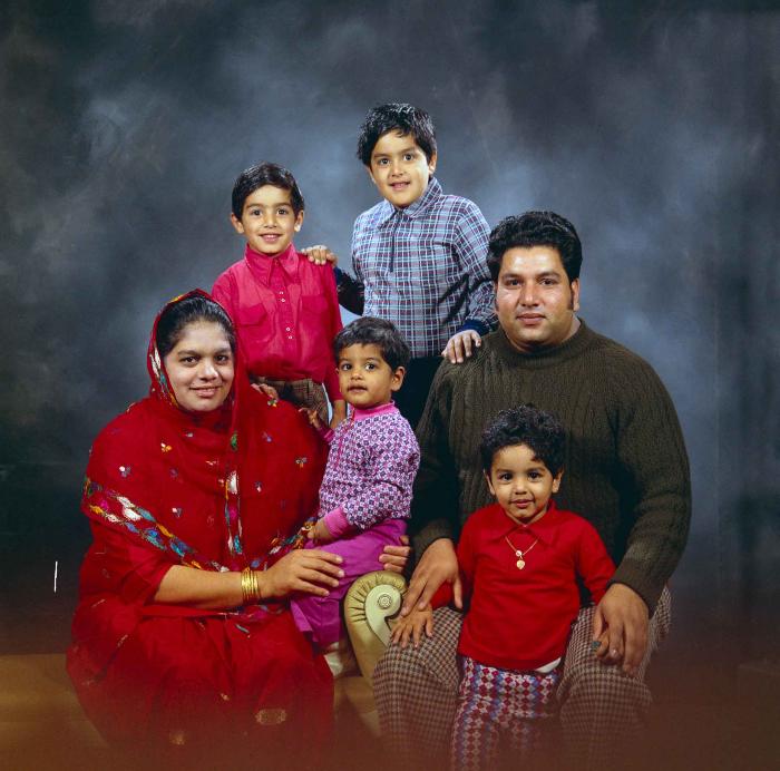 [Group photo of Amrik Grewal with his family]