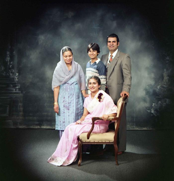 [Group photo of Kalwant Gill and her family members]
