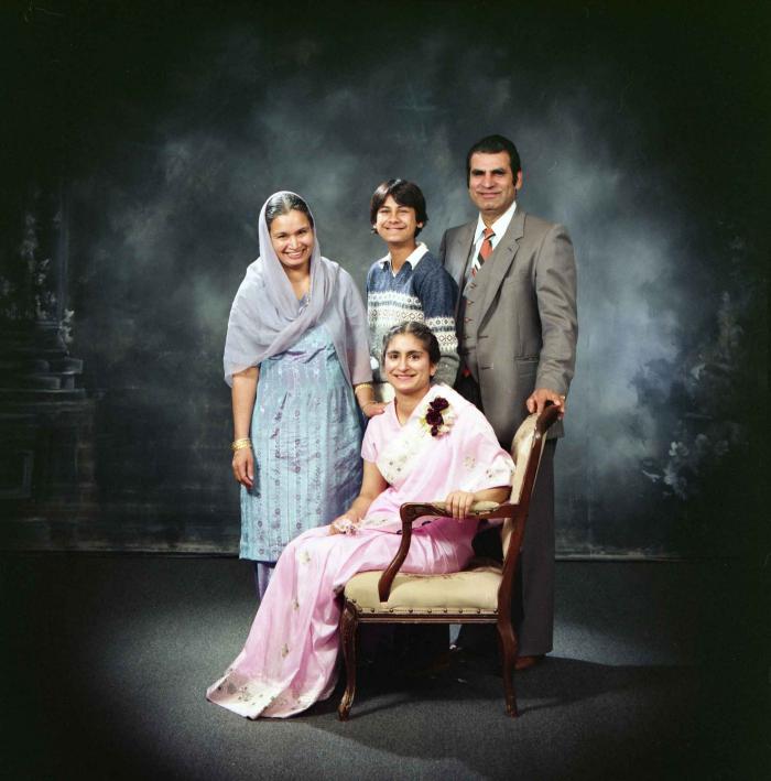 [Group photo of Kalwant Gill and her family members]