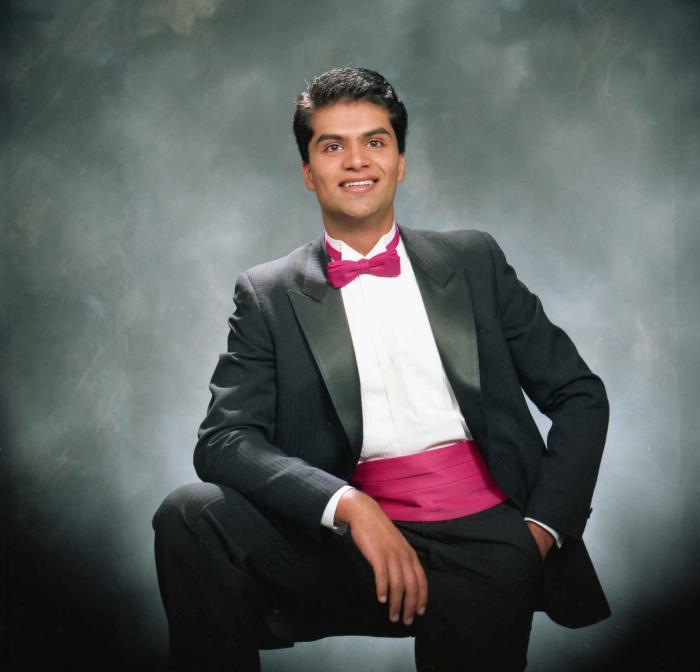 [Photo of Raj Gill]