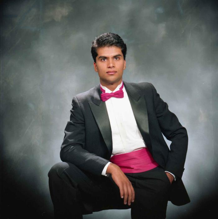 [Photo of Raj Gill]