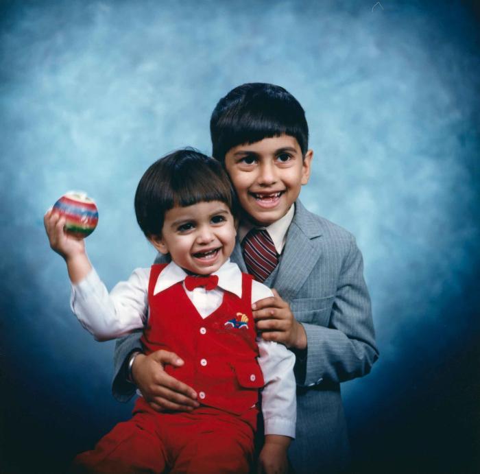 [Photo of Sukhdarshan Gill's sons]