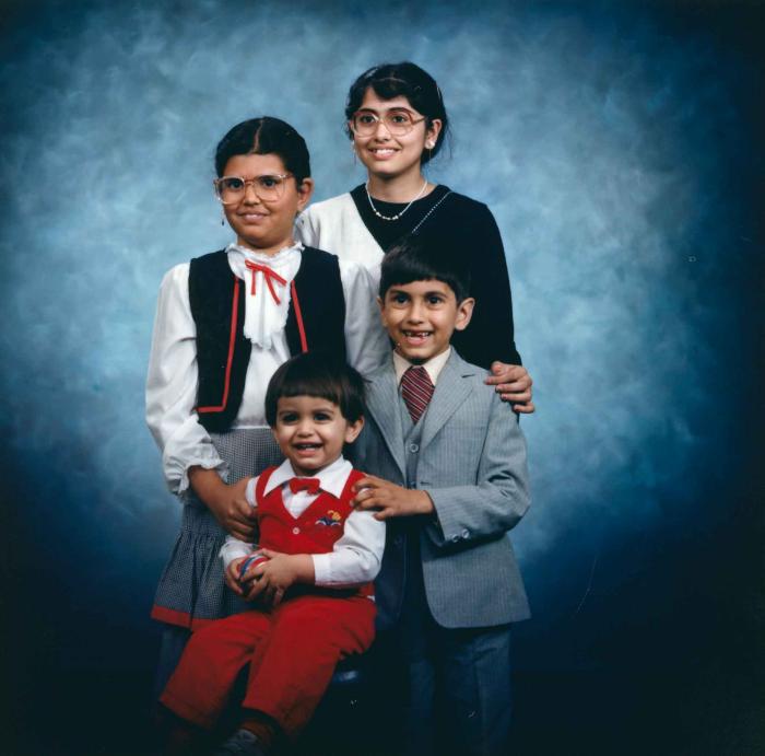 [Photo of Sukhdarshan Gill's children]