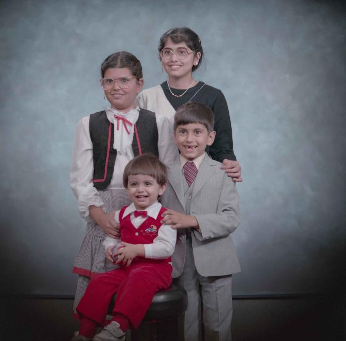 [Photo of Sukhdarshan Gill's children]