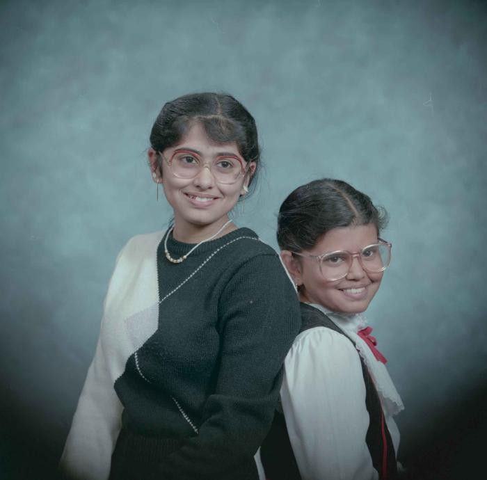 [Photo of Sukhdarshan Gill's daughters]