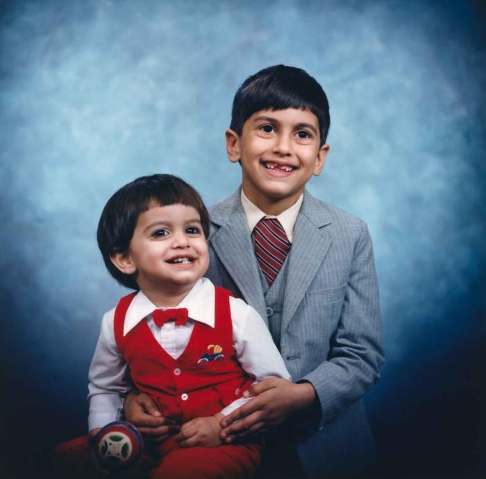 [Photo of Sukhdarshan Gill's sons]