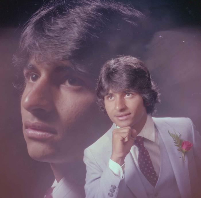 [Photo of Mahlan Gill]