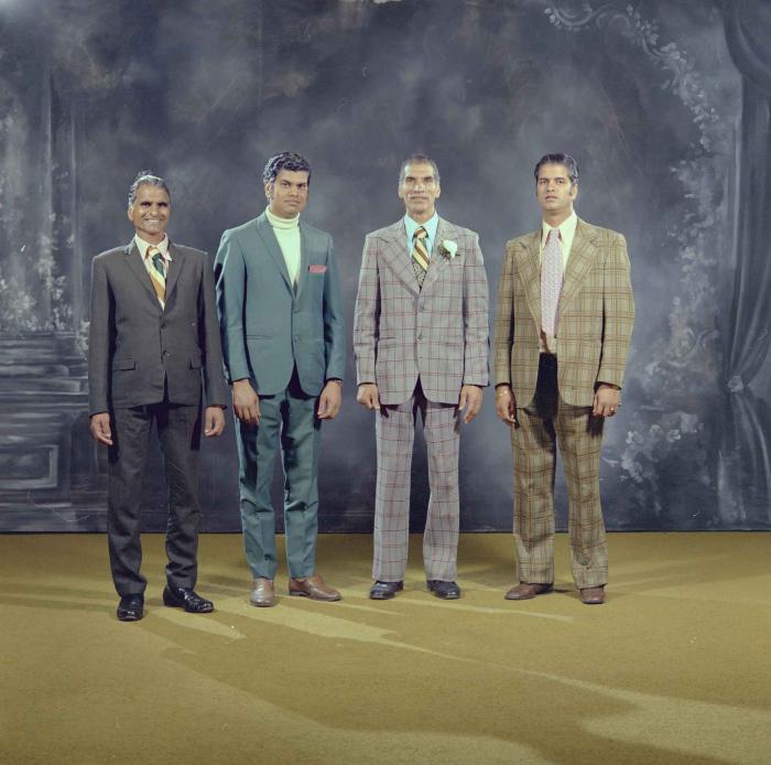 [Group photo of S. S. Gill and R. Gelna with family members]