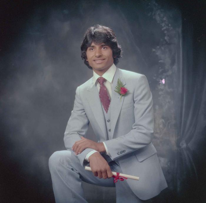 [Photo of Mahlan Gill]
