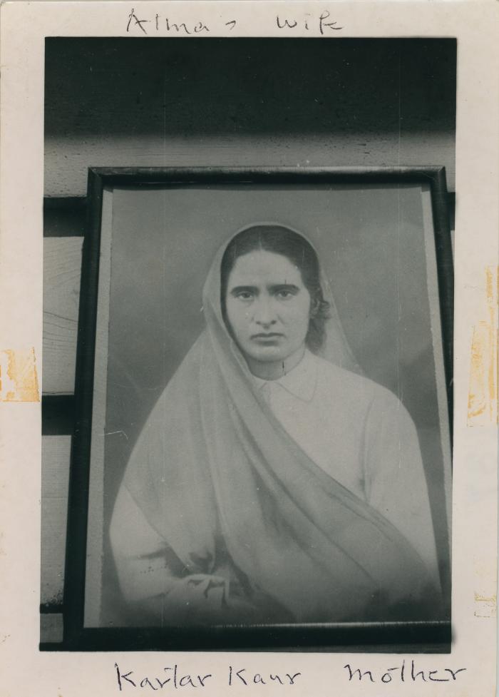 [Photo of Kartar Kaur in a frame]