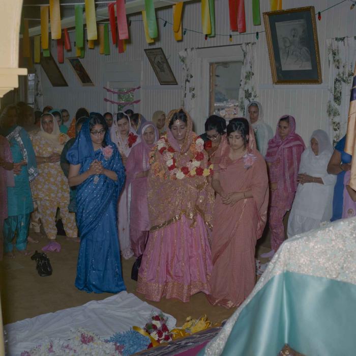 [Photo of Rajinder Thind with Kartar Kaur, Malkit Kaur and Baljit Kaur]