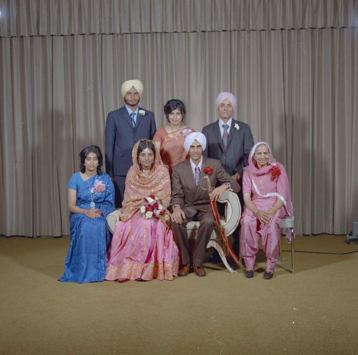  [Group photo of the newly wed couple, Rajinder Thind and Nash Gill with their family]