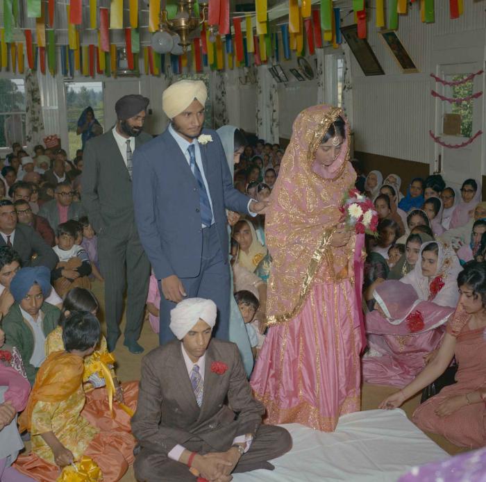 [Photo of Rajinder Thind with Jasminder Singh Thind]