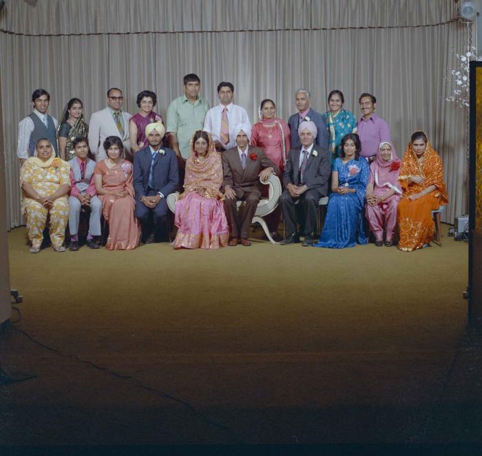  [Group photo of the newly wed couple, Rajinder Thind and Nash Gill with their family]