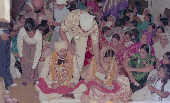 [Photo of Harbans Singh and Rupinder Toor]