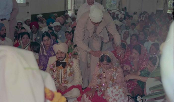 [Photo of Harbans Singh and Rupinder Toor]