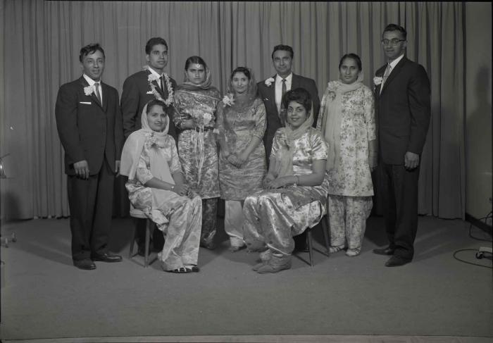 [Group photo of the Gill couple with family members]