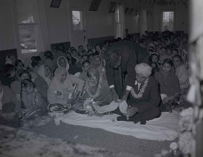 [Group photo of the Gill couple with family members]