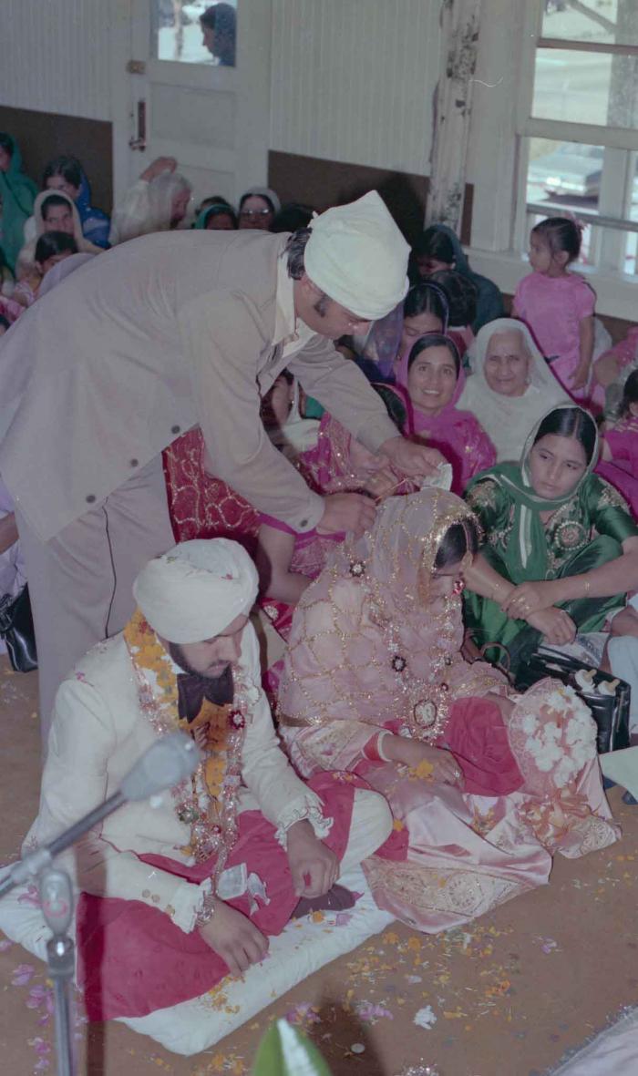 [Photo of Harbans Singh and Rupinder Toor]