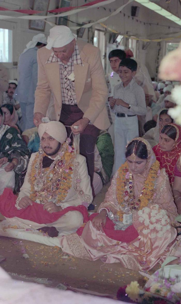 [Photo of Harbans Singh and Rupinder Toor]