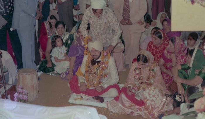 [Photo of Harbans Singh and Rupinder Toor]