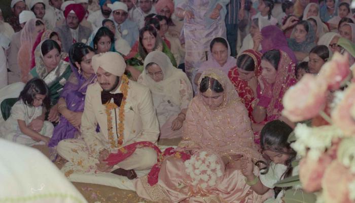 [Photo of Harbans Singh and Rupinder Toor]