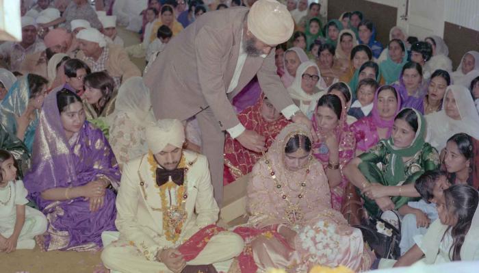 [Photo of Harbans Singh and Rupinder Toor]