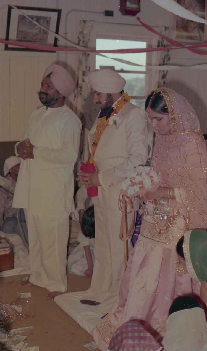 [Photo of Harbans Singh and Rupinder Toor]