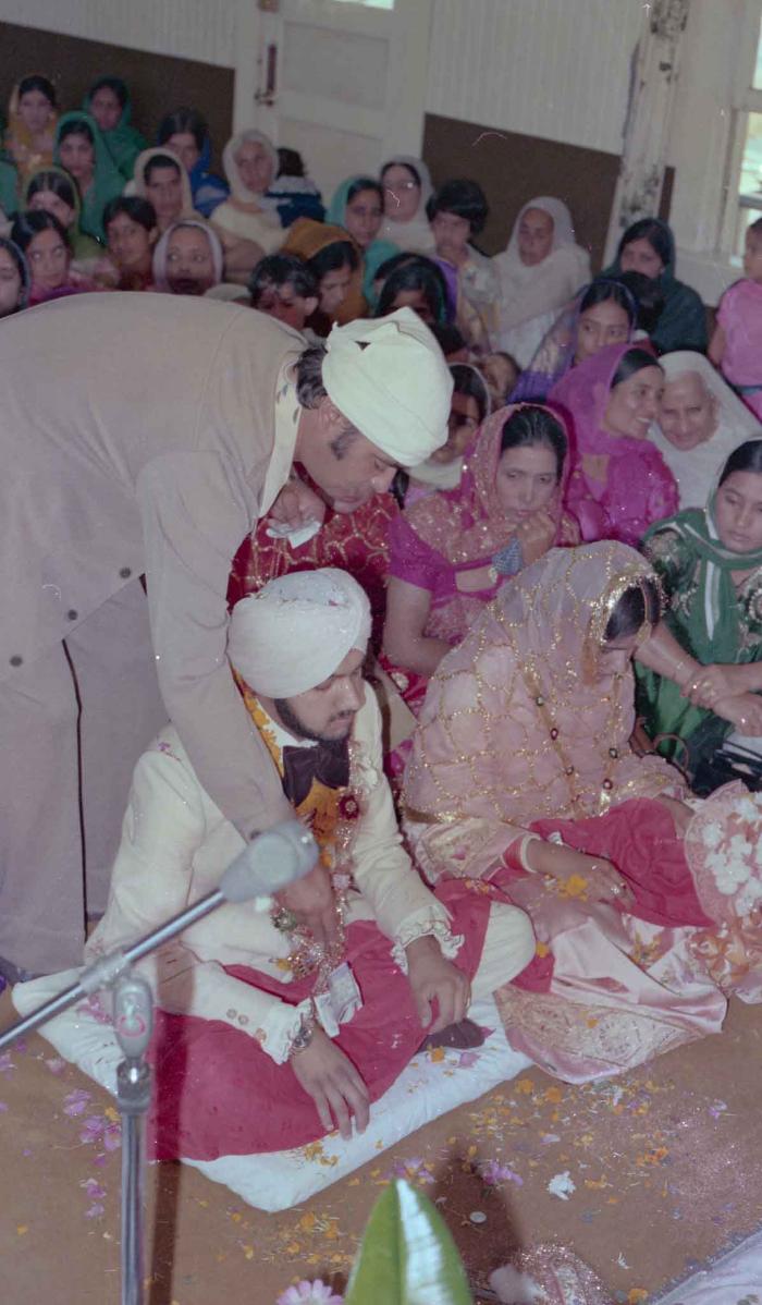 [Photo of Harbans Singh and Rupinder Toor]