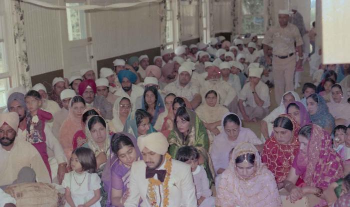 [Photo of Harbans Singh and Rupinder Toor]
