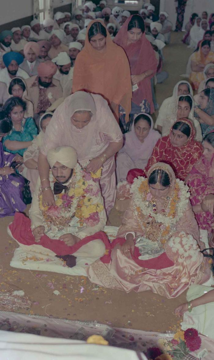 [Photo of Rupinder Toor and Harbans Singh Grewal]