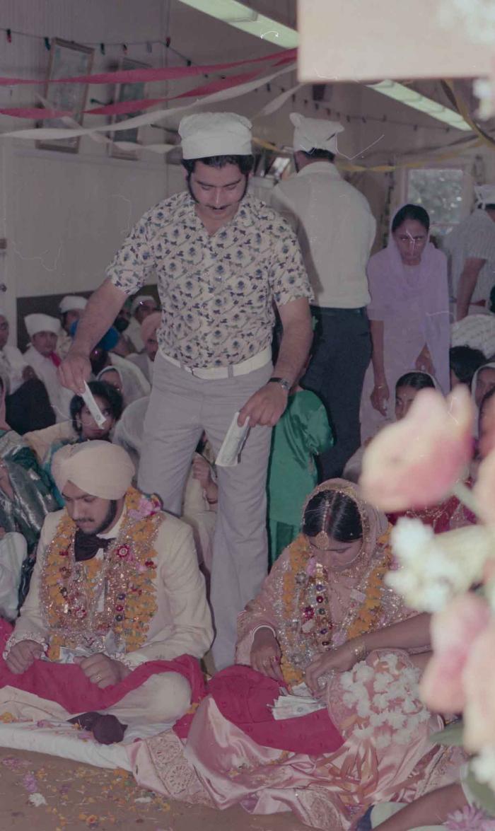 [Photo of Harbans Singh and Rupinder Toor]