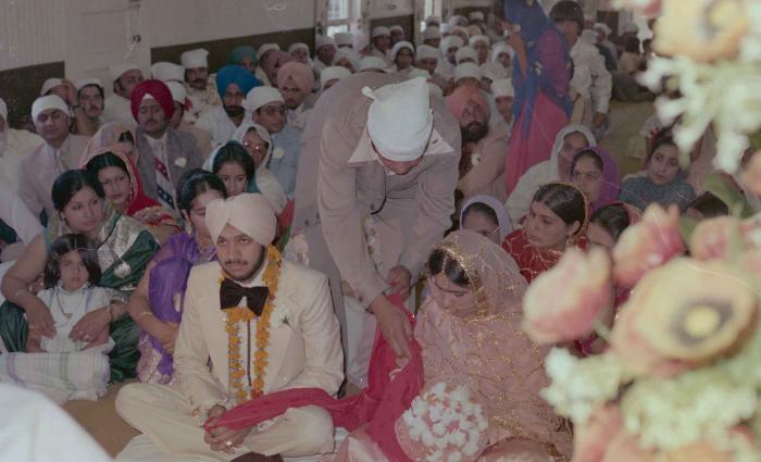 [Photo of Harbans Singh and Rupinder Toor]