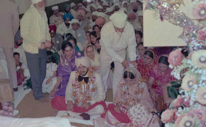 [Photo of Harbans Singh and Rupinder Toor]