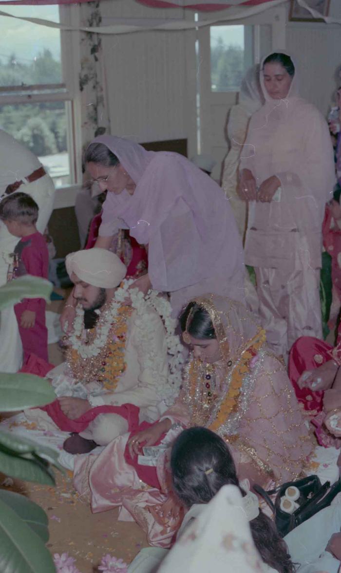 [Photo of Rupinder Toor and Harbans Singh Grewal]