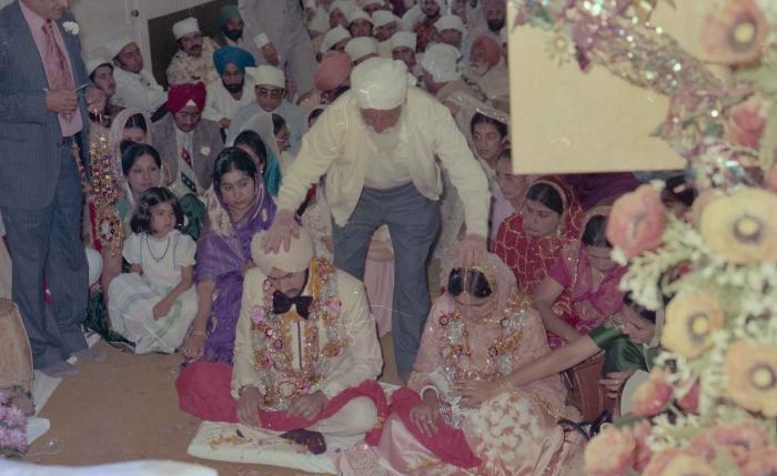 [Photo of Harbans Singh and Rupinder Toor]