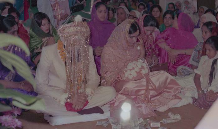 [Photo of Harbans Singh and Rupinder Toor]